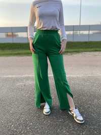 Зелені брюки кльош
