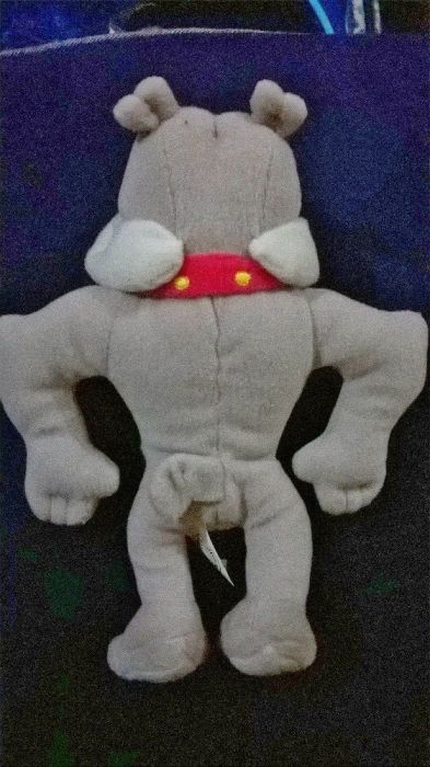 Cão em tecido um brinde dos ovos da Páscoa da Kinder Ferrero
