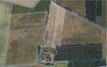 Magazyny/ mieszkania + grunt rolny 7,6 ha - Szkudła