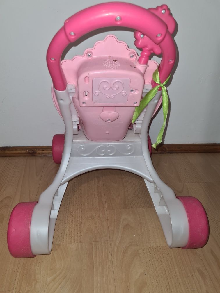 Wózek pchacz z lalką grąjacy fisher price