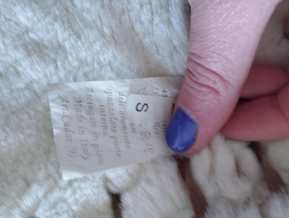 Colete de pele com pêlo dentro