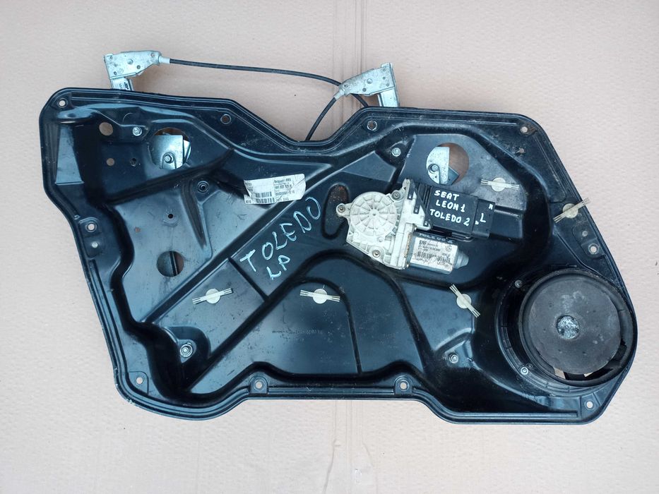 Elektryczny podnośnik szyby drzwi seat Leon1, Toledo2.