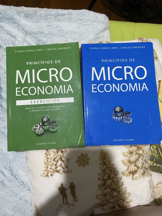 Conjunto de manua e livro de exercicios de microeconomia