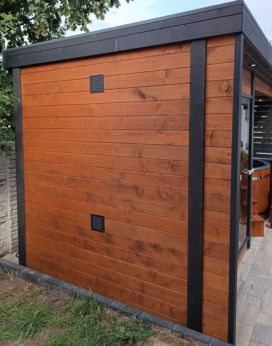 sauna ogrodowa z miejscem na balie, nowoczesne spa zewnętrzne premium
