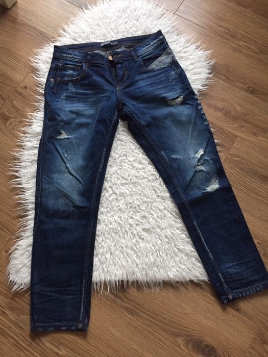 Jeansy z przetarciami Zara 34