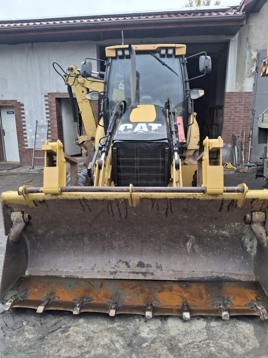 Koparko-ładowarka CAT 428E