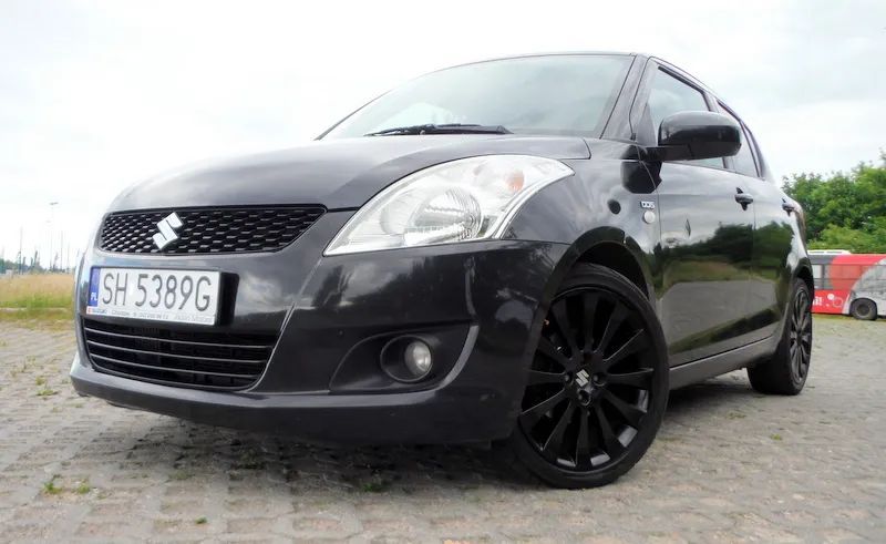 Suzuki Swift 1WłaścicielBezwypadkowySerwisiwanySuzukiASOLatoZimaOponyNaAlumach