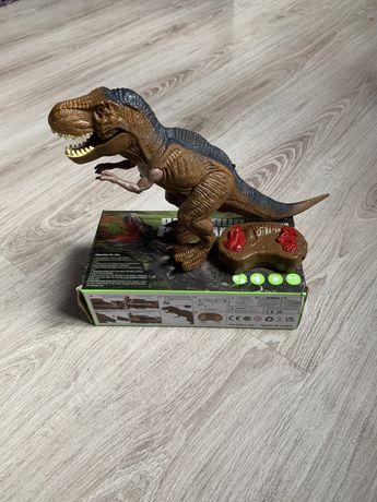 Іграшка динозавр на пульту