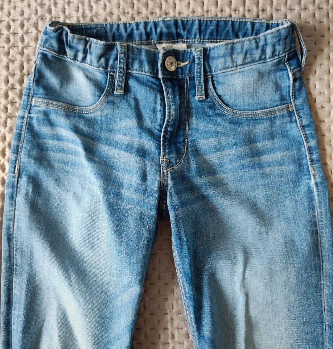 Spodnie jeansy jasne dziury na kolanach skinny H&M r.140 9-10 lat