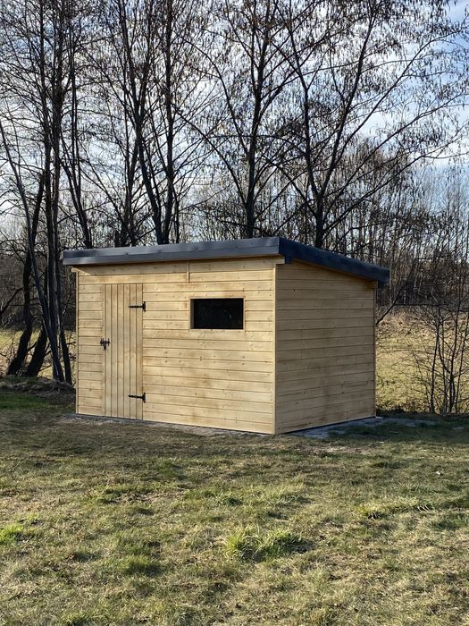 Konstrukcje drewniane: Wiaty, Garaże, domki całoroczne