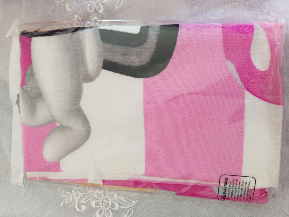 Toalha de praia da Minnie.