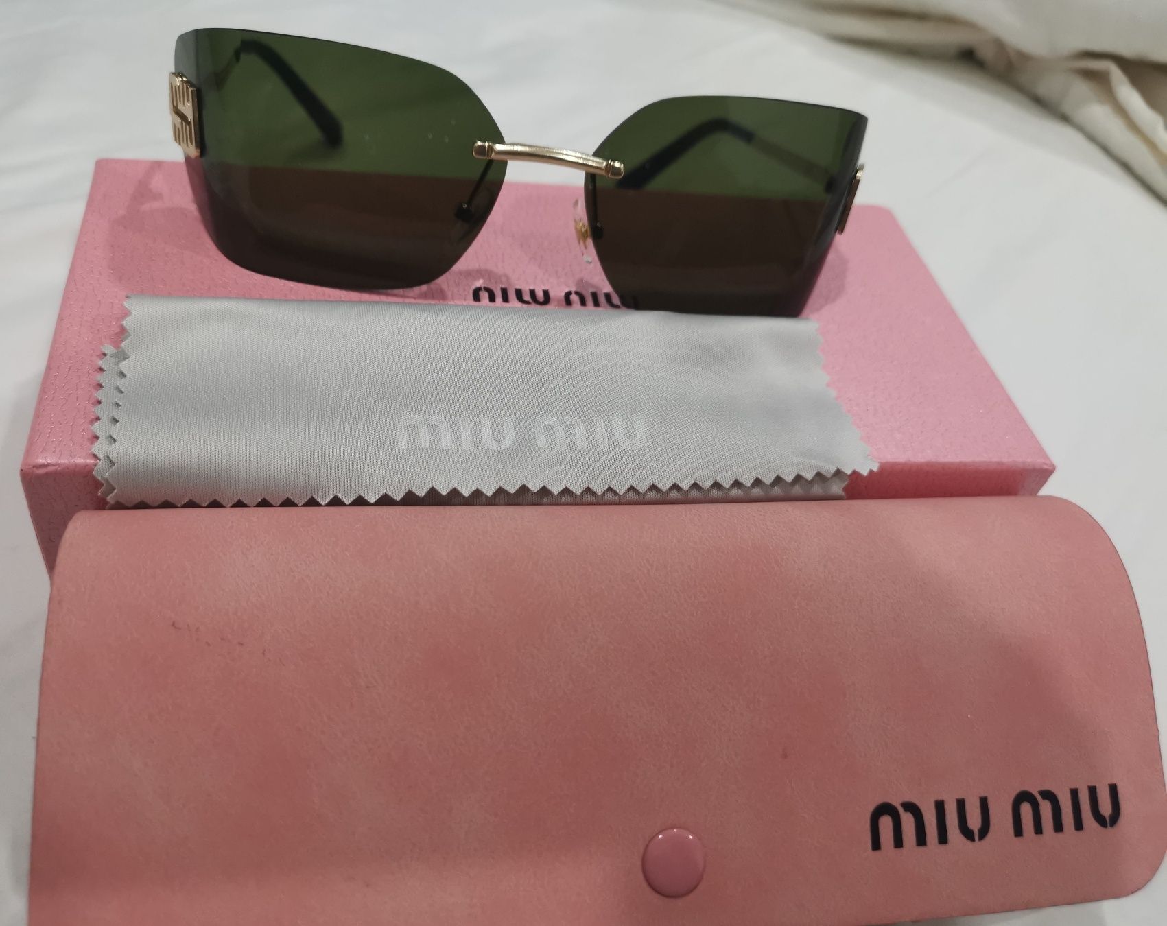 Óculos de sol miu