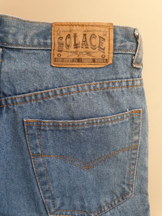 Spodnie klasyczne jeansy z prostymi nogawkami vintage niebieskie nowe