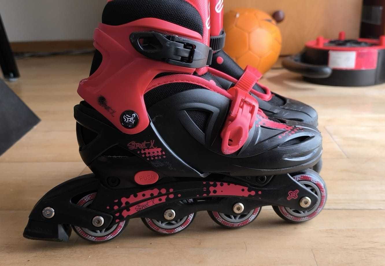 Patins de criança em bom estado, com capacete e proteções