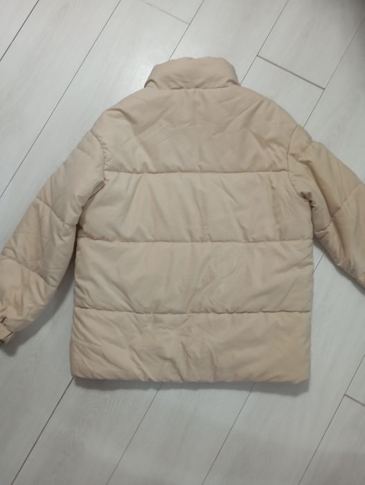 Пуховики і куртки