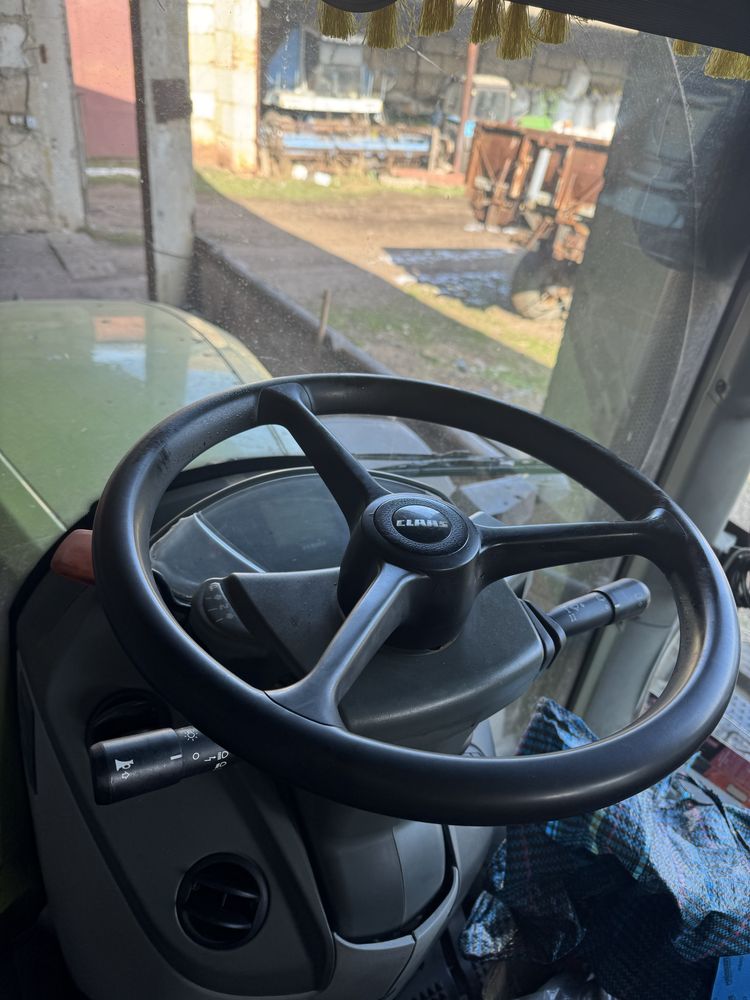 Трактор Claas Axion 940 2014