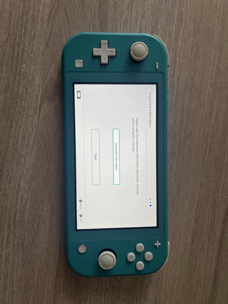 Nintendo Switch Lite + 3 gry