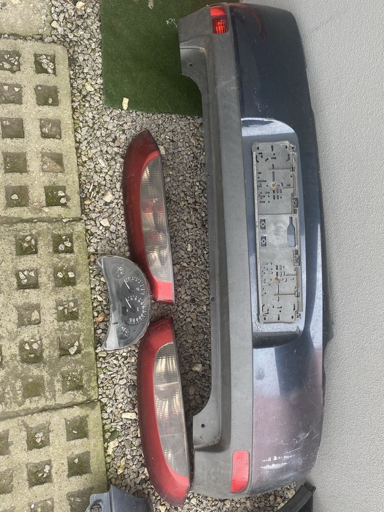 Opel Corsa C lampy, zderzak, blotnik, licznik