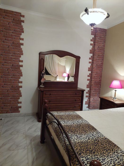 Quarto aconchegante para uma pessoa