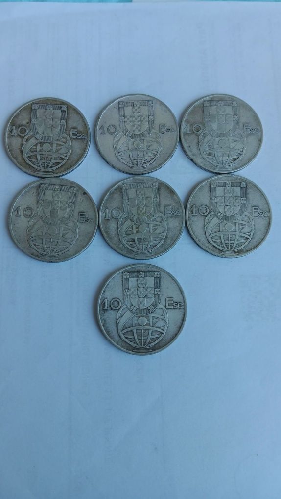 7 moedas prata de 10 escudos.