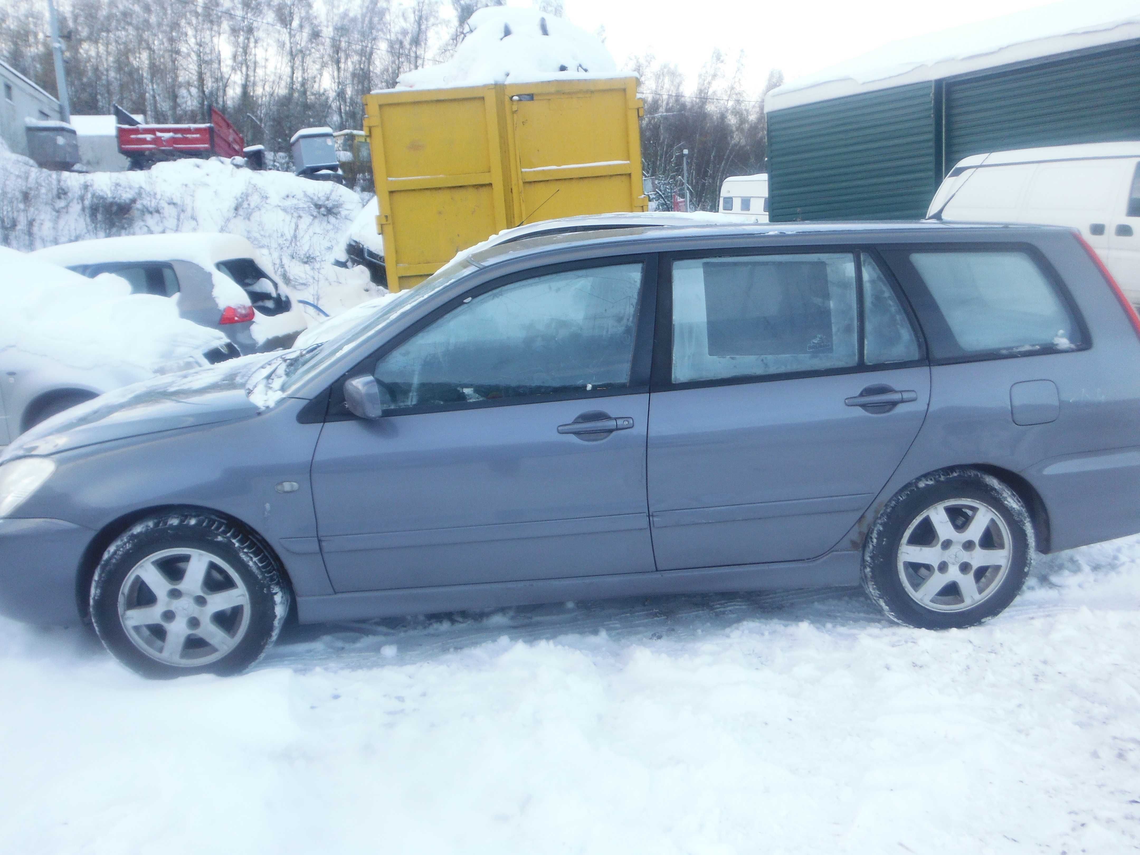 Mitsubishi Lancer VII 1,6 roleta bagażnika, części transport FV