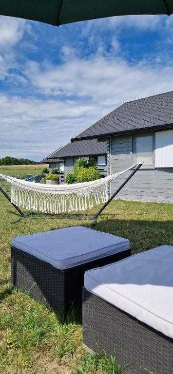 Domek Mikołajki z własną plażą, pomost, łódka Szary domek Mikołajki