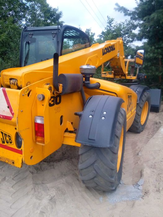 Wynajem ładowarki , usługi ładowarką teleskopową.