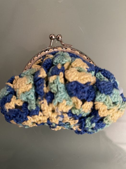 Porta moedas,crianca e senhora