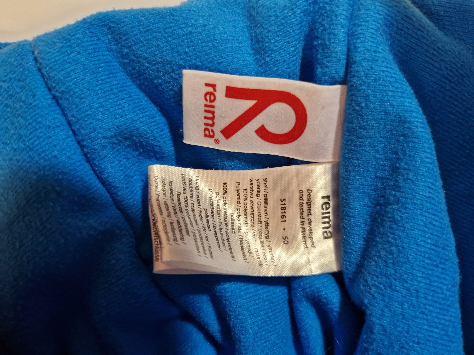 Reima 50 czapka zimowa niebieska daszek rzep pod brodą