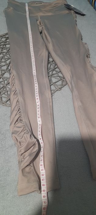 Damskie leginsy z marszczeniami po boku rozmiar S Reebok