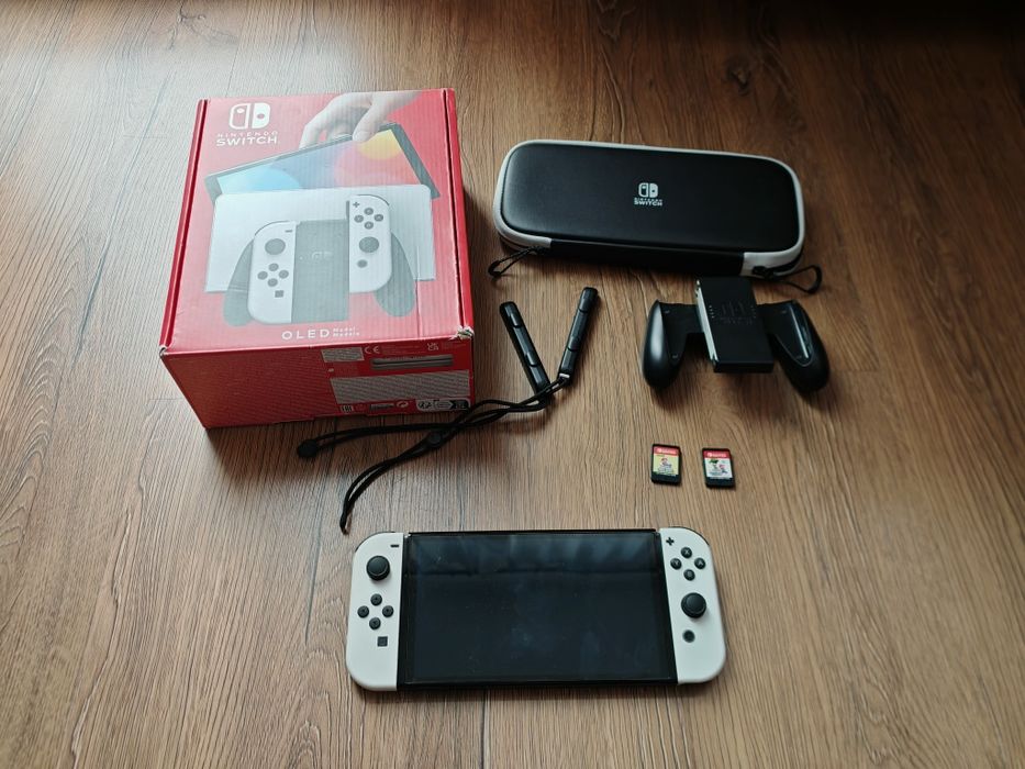 Nintendo switch oled + mario wonder + mario delux