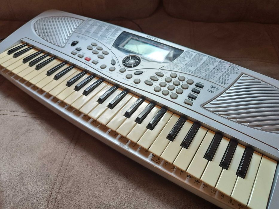 Сентизатор електропіаніно меделі medeli