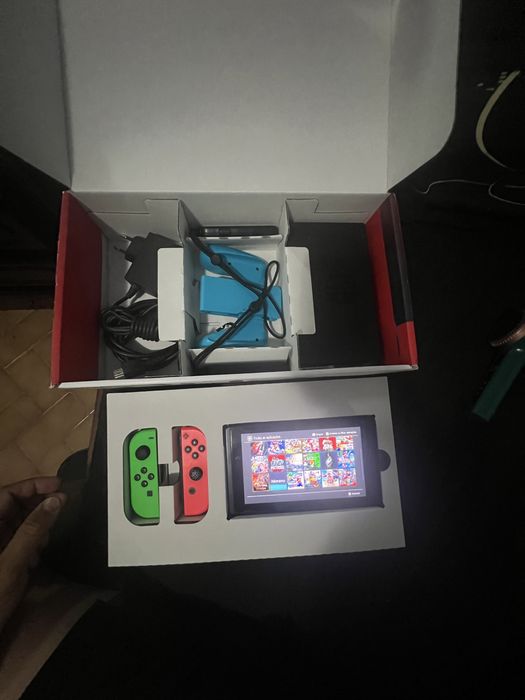 Nintendo switch v1 +256gb 20 jogos