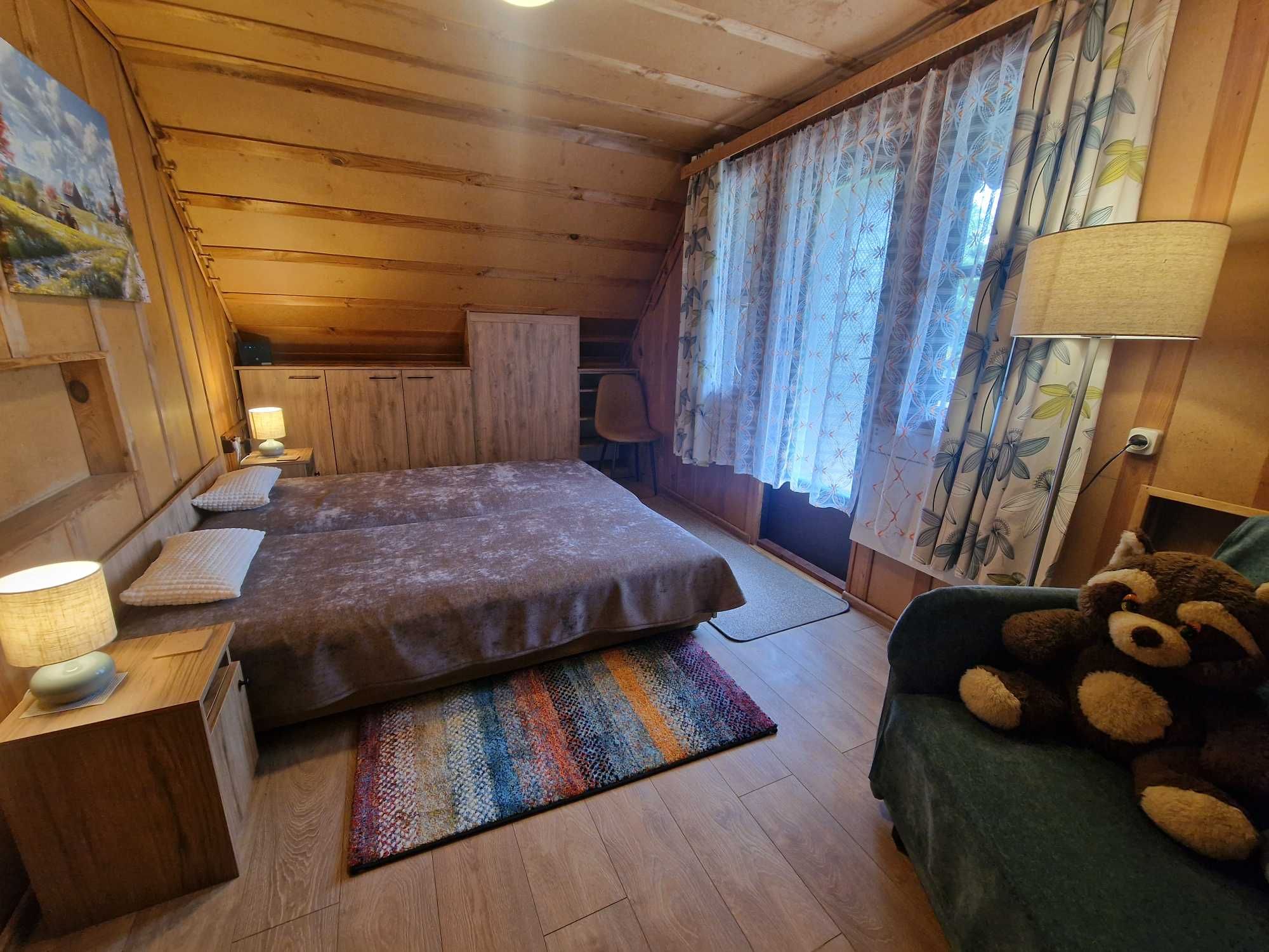 domek letniskowy nad jeziorem Wulpińskim, łódka do dyspozycji Gości
