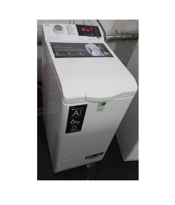 Пральна машина AEG L6TBA664 верхнє (вертикальне) 6кг а+++