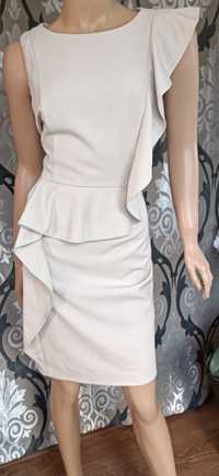 Calvin Klein elegancka beżowa sukienka klasyczna