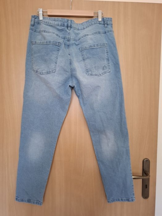 Spodnie jeansowe rozm. 44 z dziurami