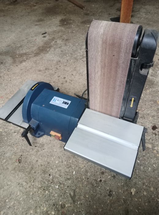 Lixadeira de cinta dupla.