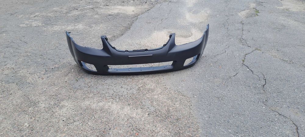 Бампер Kia Cerato 06–09 р
