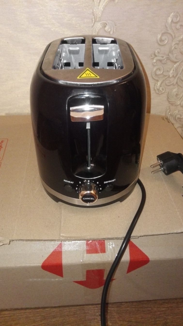 Тостер ROTEX RTM150-B