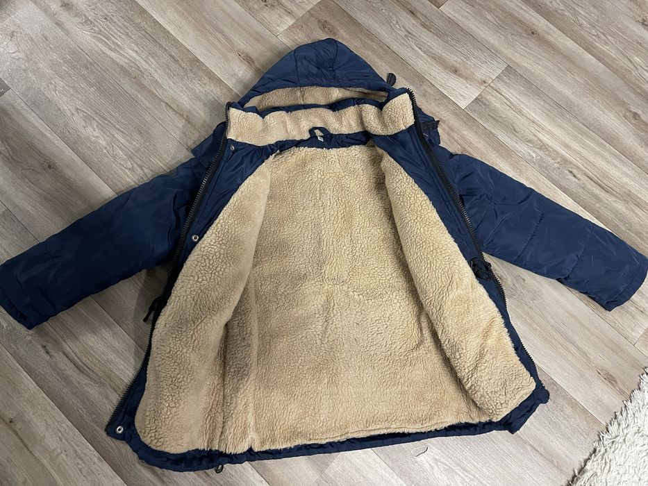 Зимова куртка на хлопчика 140-146 см