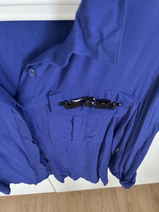 Niebieska koszula rozm. L.