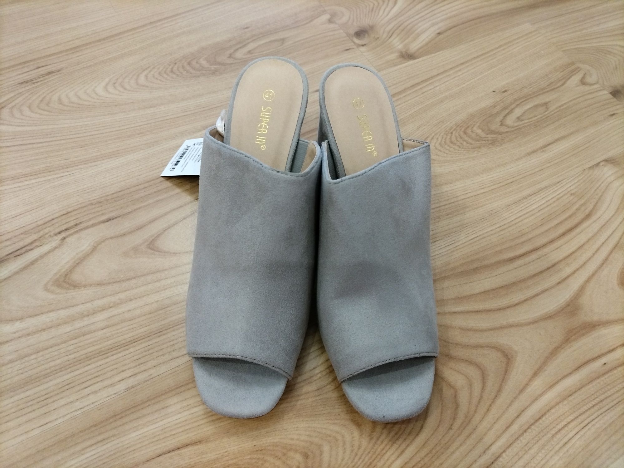 Buty damskie na obcasie klapki