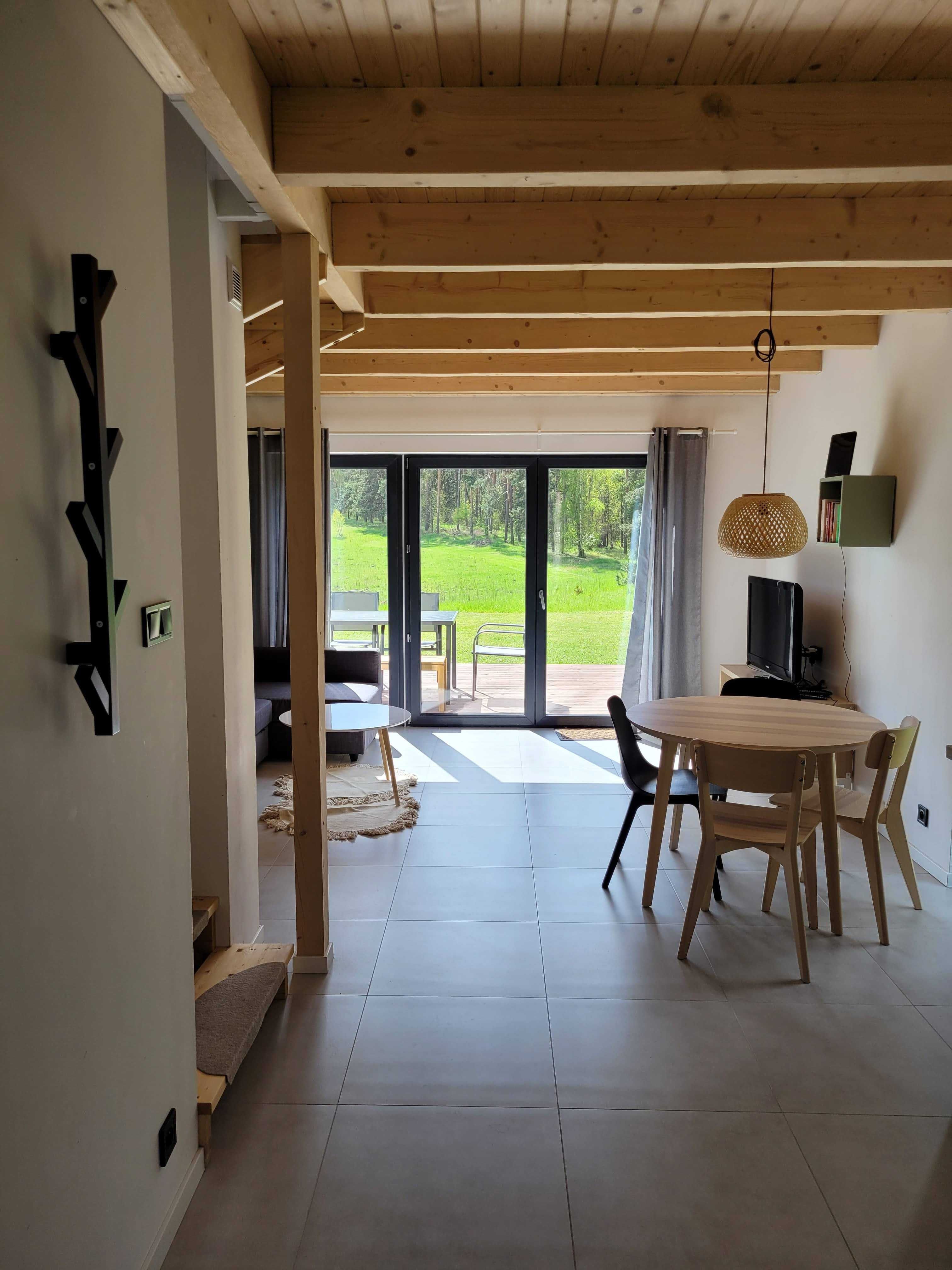 Domki Ryn Mikołajki Mazury jezioro i las