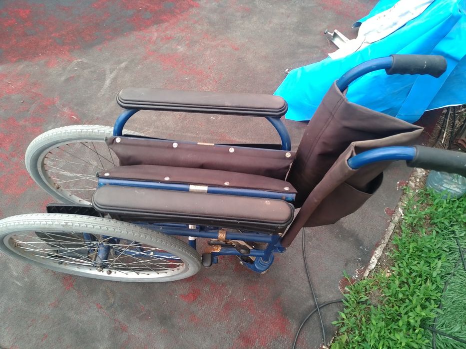 Инвалидная коляска искра.