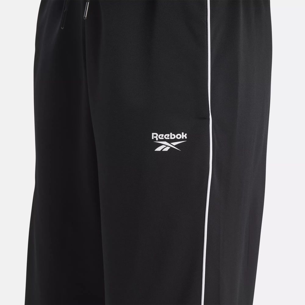 Жіночі спортивні штани reebok identity back vector