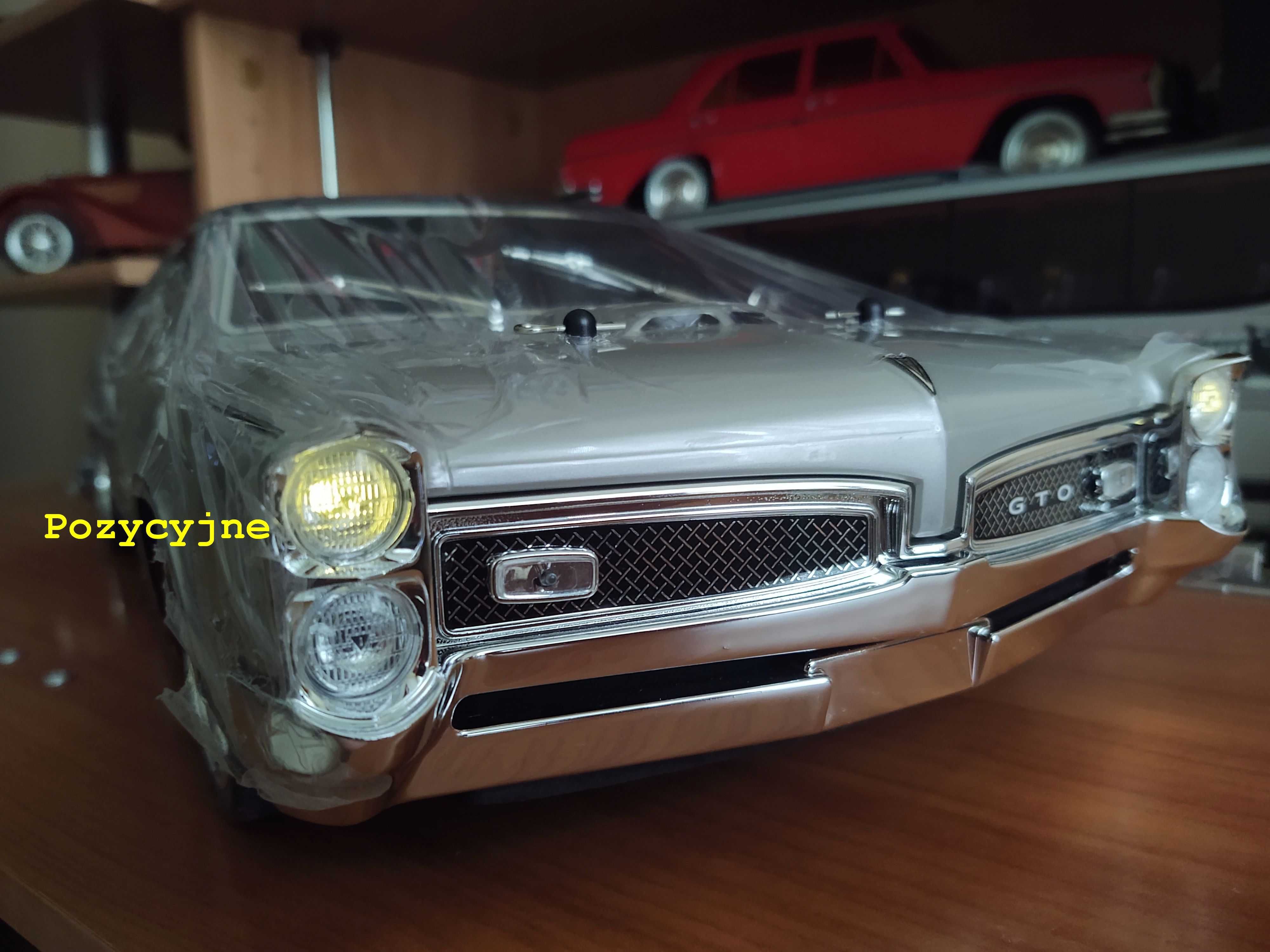 Pontiac GTO 1967 RTR KYOSHO skala 1:10 4WD Oświetlenie.Fabr Nowy.