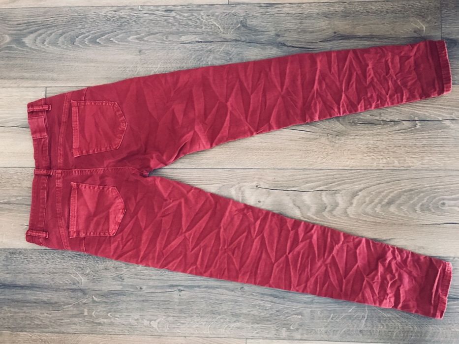 Czerwone cegiełkowe bordowe jeansy R.M elastyczne wyprzedaż okazja