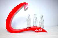 Coca-Cola expositor com garrafas