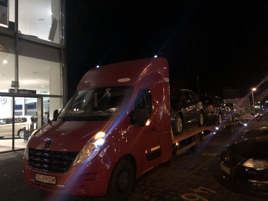 Transport samochodów aut z Niemiec Polska laweta Śląsk holowanie bus